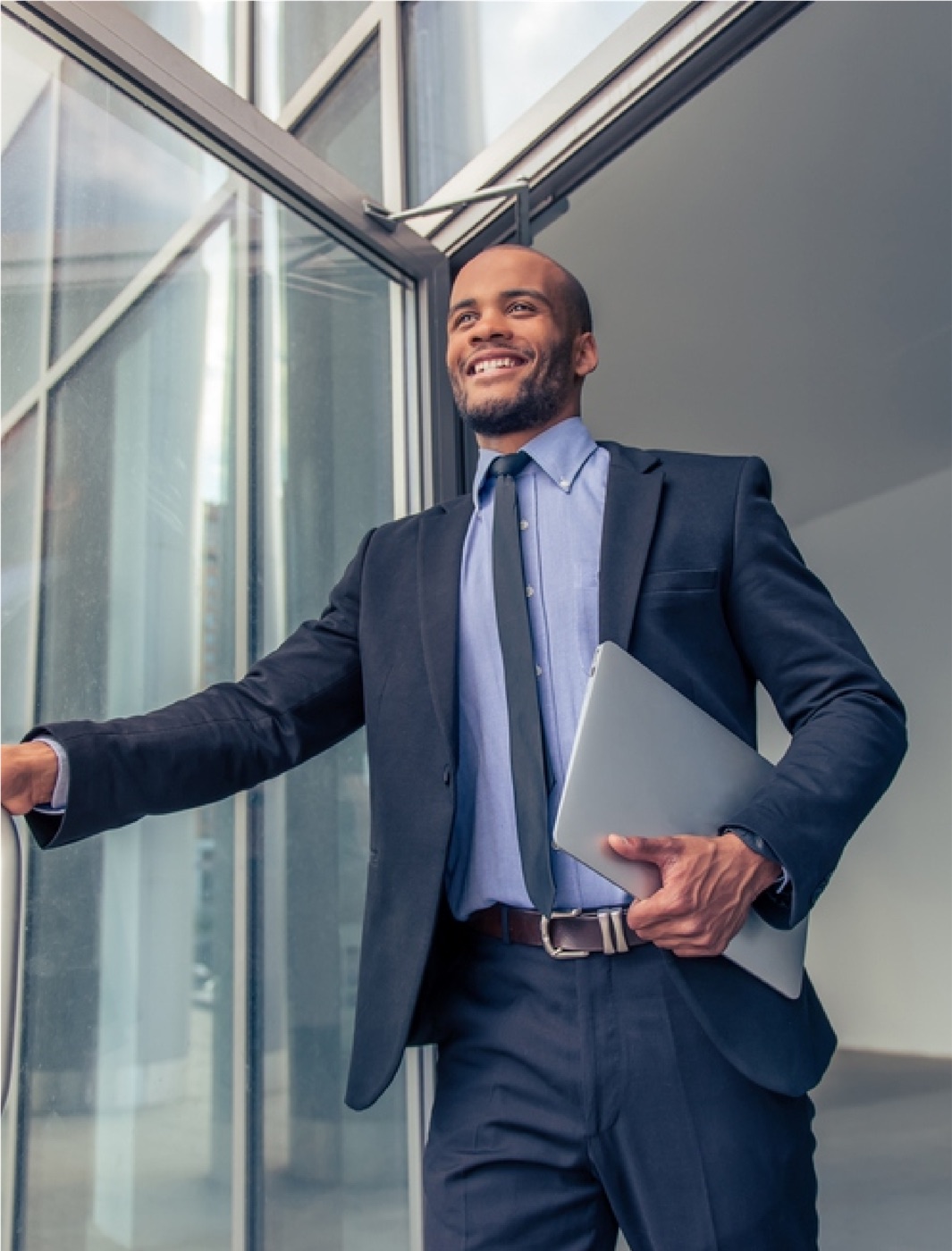 Acumen professional outside a corporate glass building in Nigeria