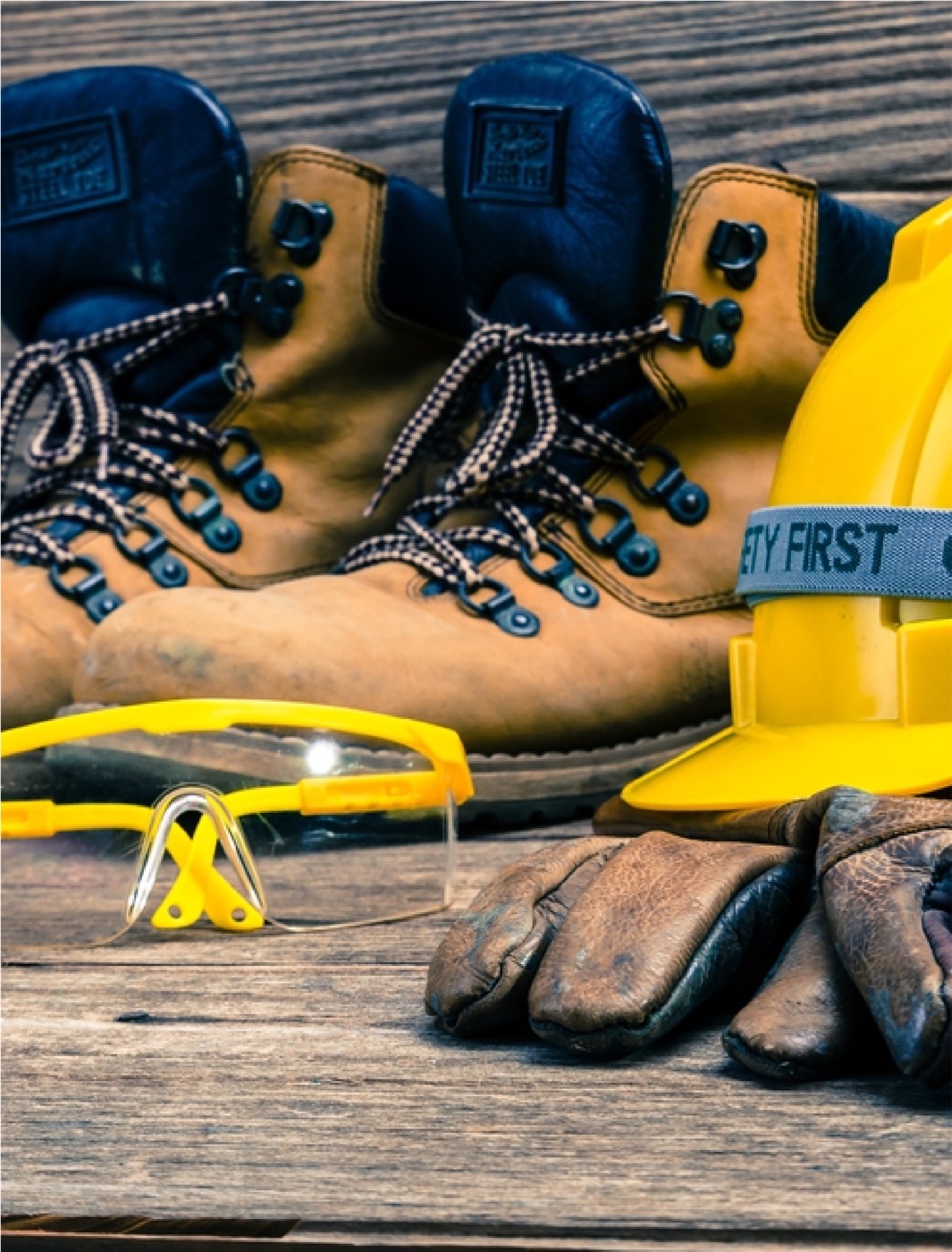 Personal protective equipment: safety boots, helmet, gloves and goggles